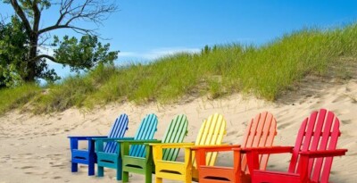 Rainbow chairs on the beach